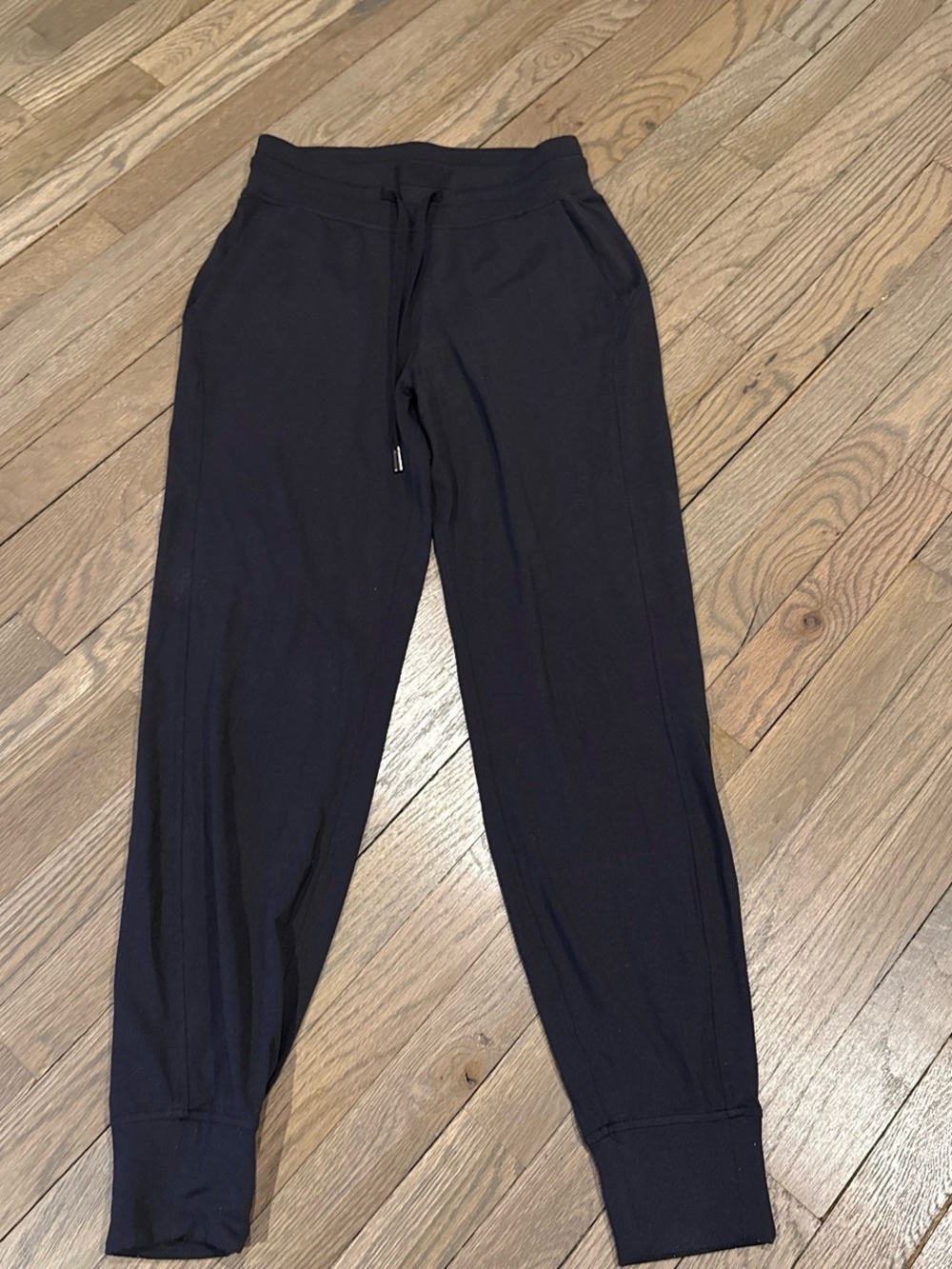 lululemon athletica Black Women's Joggers with drawstring waist and pockets.